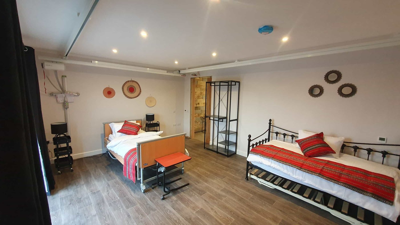 Spacious bedroom with twin beds and modern decor