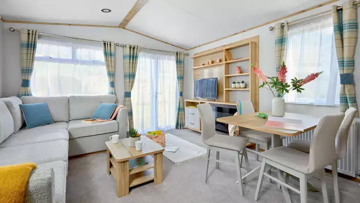Bright cozy living room with modern furnishings and decor