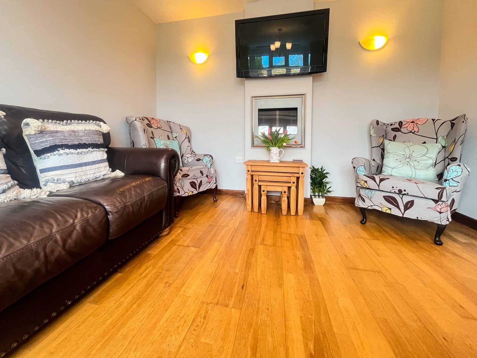 Cozy living room with modern furniture and hardwood floors