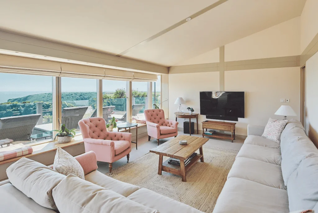 Modern living room with ocean view and stylish decor