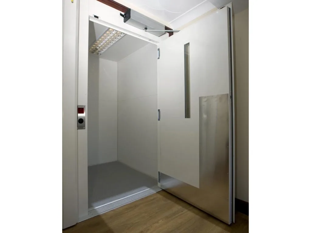 Modern empty elevator interior with open doors
