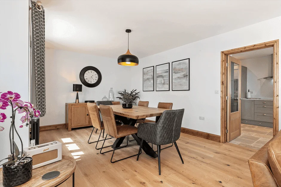 Modern dining room with wooden table and stylish decor