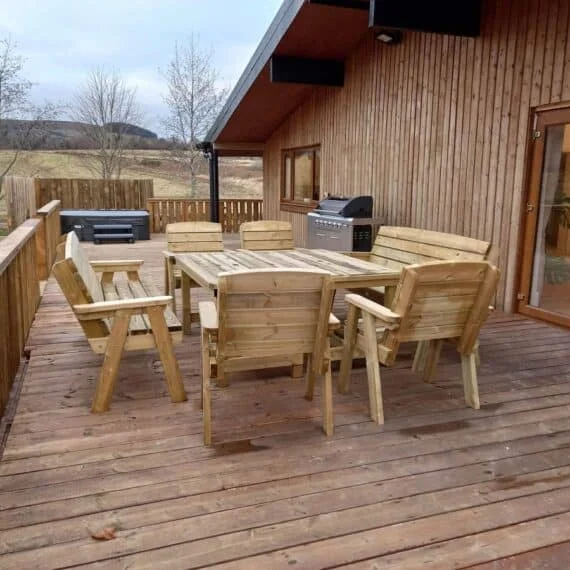 Wooden patio furniture on a house deck