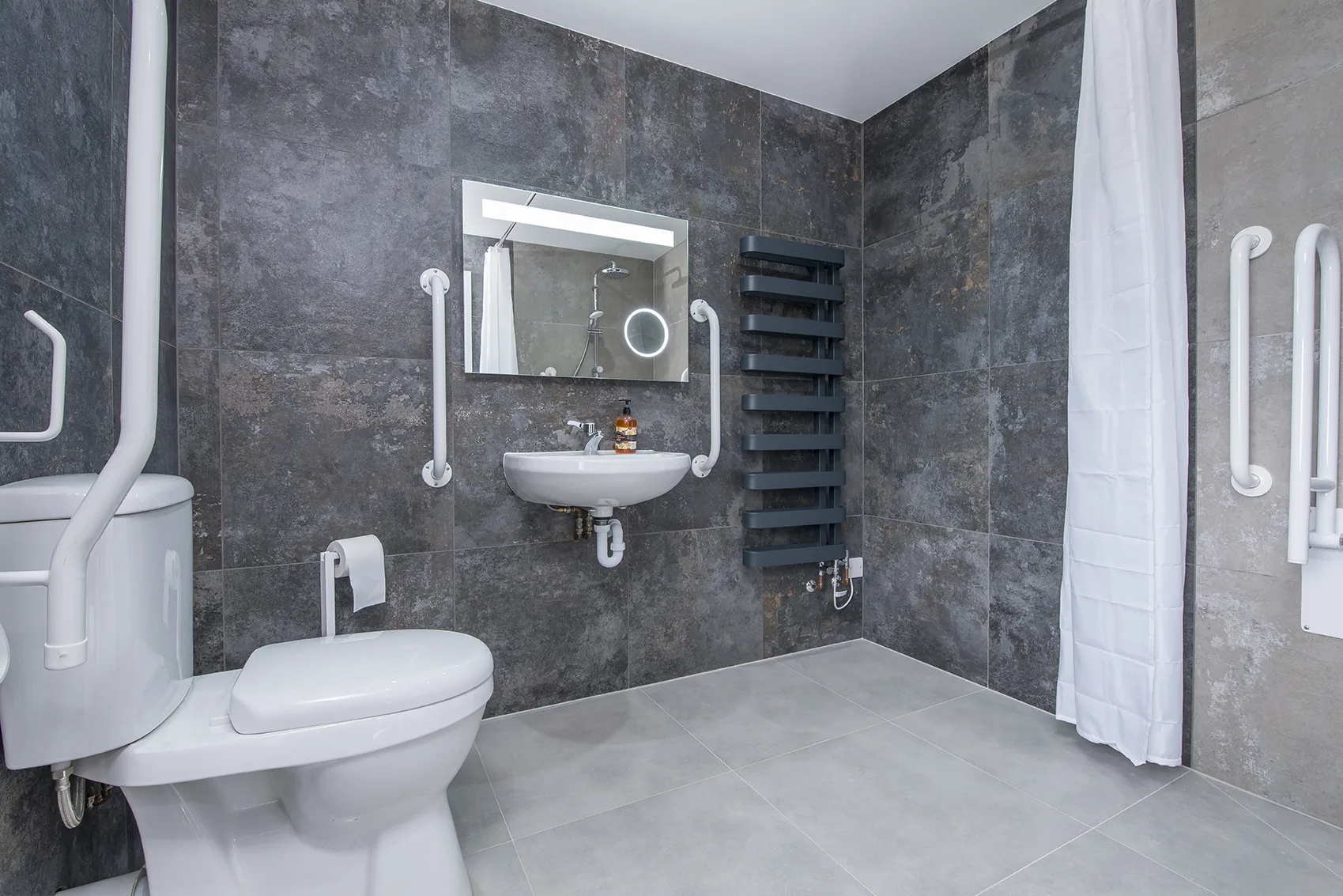 Accessible bathroom with safety features and modern design