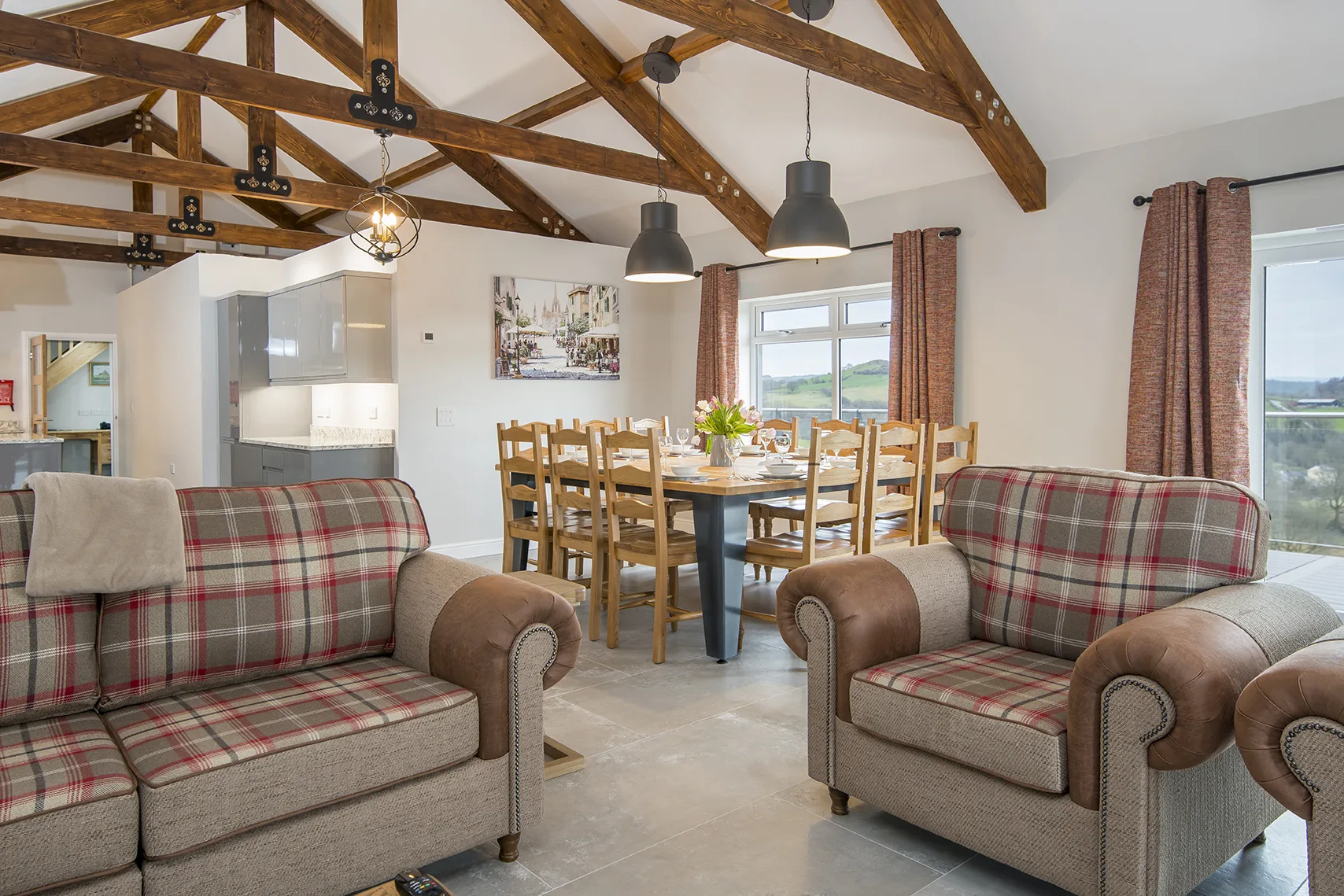 Cozy rustic dining room with exposed wooden beams