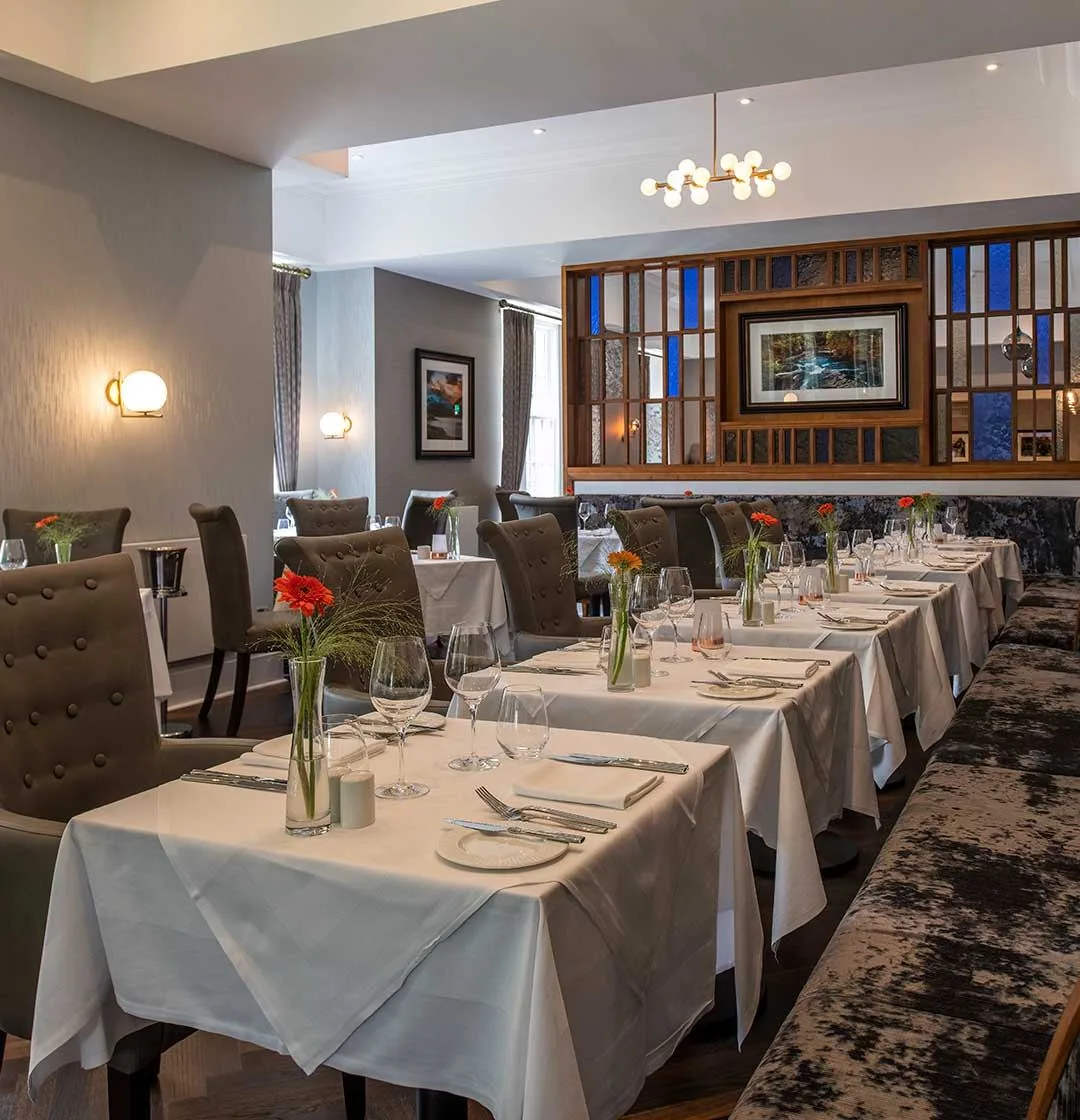 Elegant restaurant interior with set tables and modern decor
