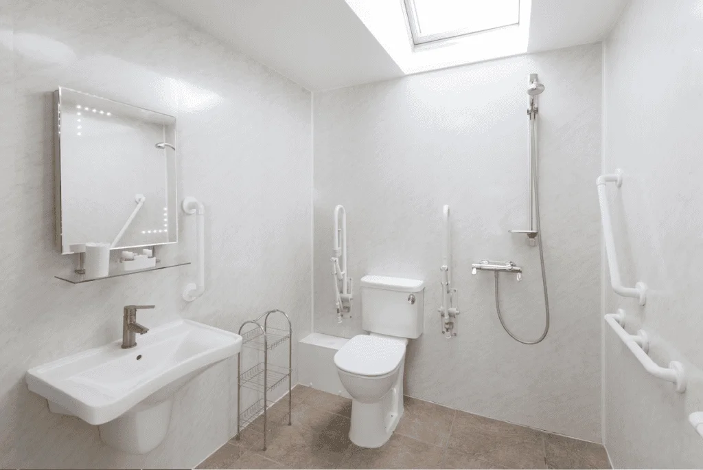 Accessible bathroom with grab bars and modern fixtures