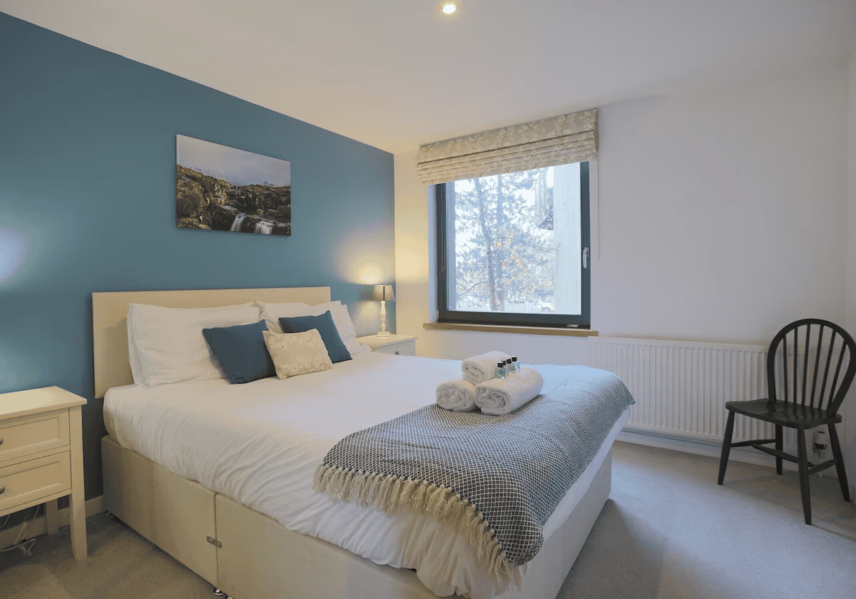 Modern bedroom with clean design and natural light