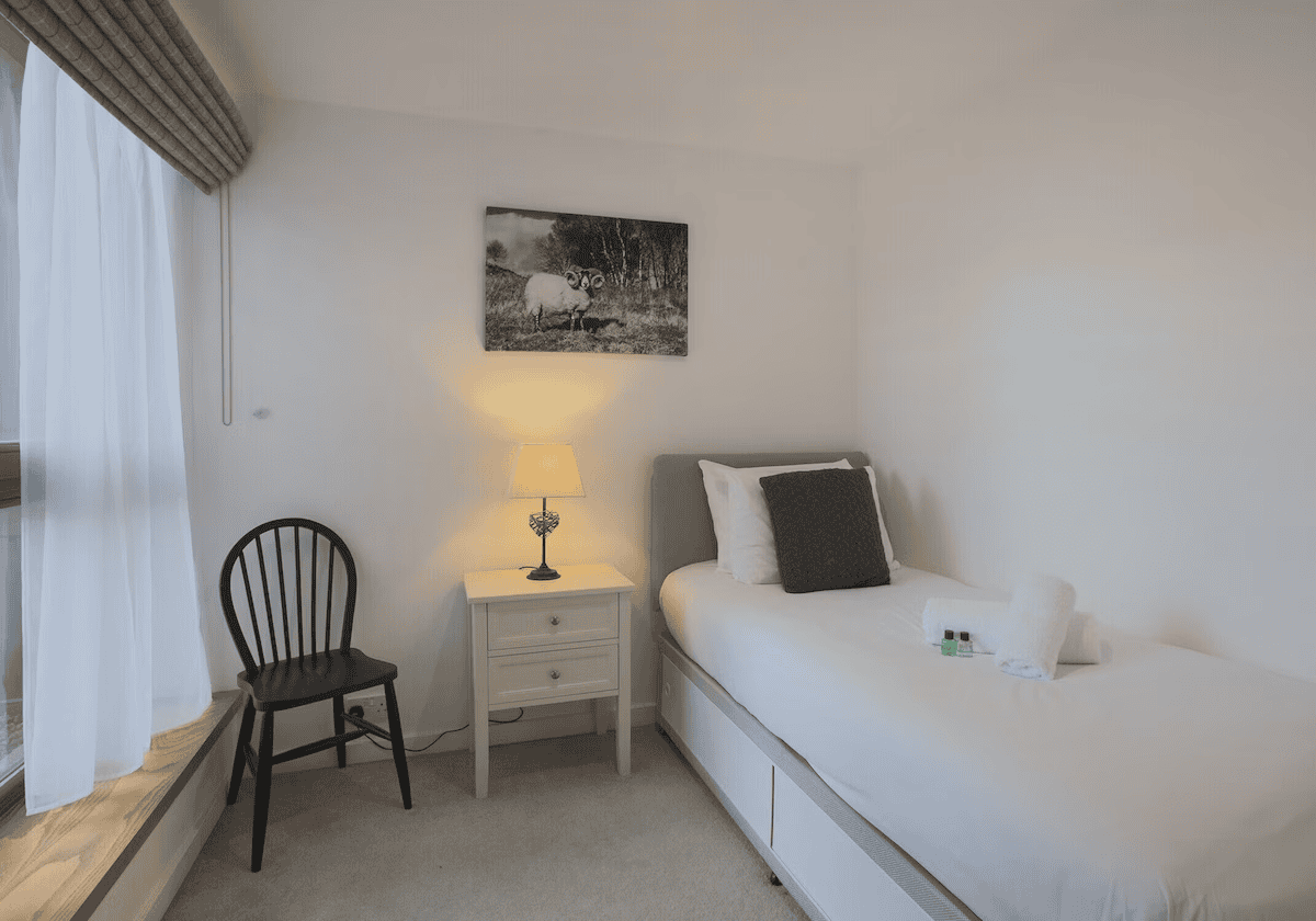 Simple modern bedroom interior with wall art